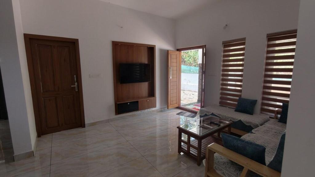 Casa di  m² con 1 camera(e) e 3 bagno(i) privato(i) in zona Sultan Bathery, Villa e casa – Wayanad (foto 1)